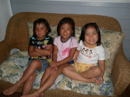Kasen, Mia and Isabella sitting on couch